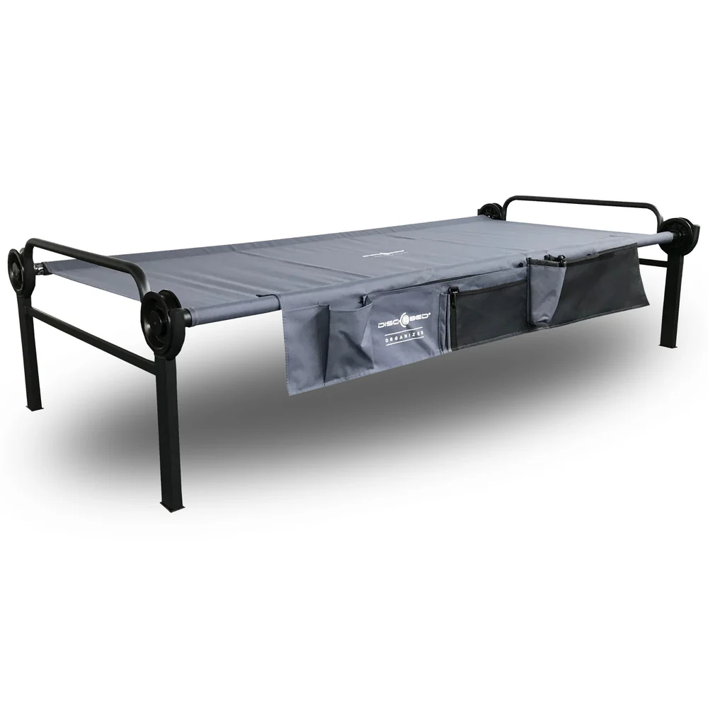Easy to assemble without any tools
• Comfortable lying surface
• Sturdy and stable steel frame
• Loadable up to 227 kg
• Very durable and easy to clean
• Practical carrying bag, compact pack size
• Ideal for camping holidays or as a guest bed
Weight 14kg
Load capacity: 227kg
External dimensions: Lx208cm Bx100cm Wx52cm 
Height lying surface 41cm
Lying surface Lx201cm Wx88cm 
Pack size bag Hx100cm Lx52cm Wx11cm 
Specifications
Frame • powder-coated,
 rust-repellent steel frame
Fabric • 600D polyester, PVC coated
Scope of delivery:
2 straight frames
1 polyester mat anthracite
1 side pocket anthracite
4 black discs
4 Outer rod
2 center rods
4 foot plugs
1 transport bags anthracite
2 stack adapters
1 safety strap

